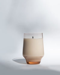 Close-up of drink against white background