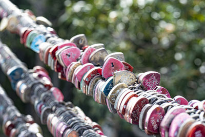 Love locks on the railings at the sky bridge station at the top of the mountain in langkawi