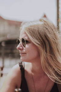 Portrait of young woman wearing sunglasses