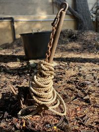 Close-up of rope tied on anchor