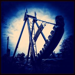 Low angle view of ferris wheel