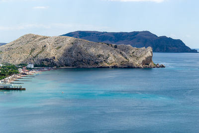 Scenic view of sea and bay against sky