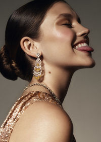 Close-up of young woman looking away