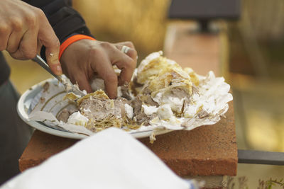 Close-up of man holding food