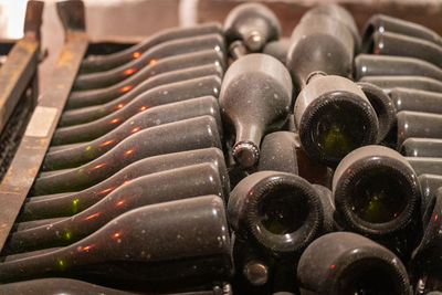 Full frame shot of wine bottles in a cave
