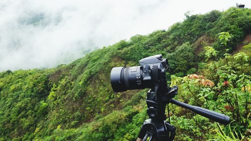 Camera on mountain during foggy weather