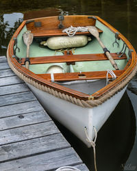 High angle view of boat moored in lake