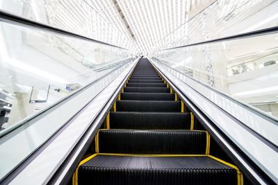 Low angle view of escalator in modern building