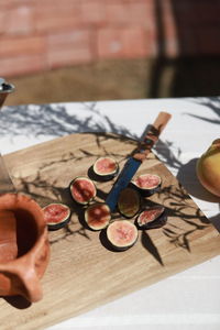 High angle view of hand holding book