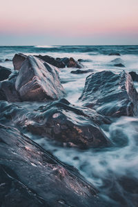 Scenic view of sea against sky during sunset