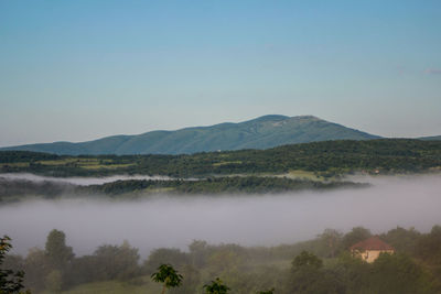 Scenic view of mountains against sky