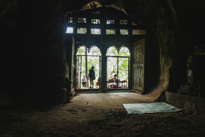 People in corridor of building