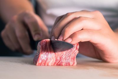 Close-up of person preparing food