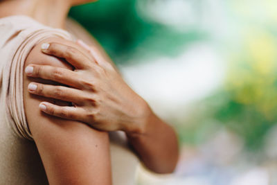 Close-up of woman hand on finger