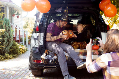 People on street at market stall