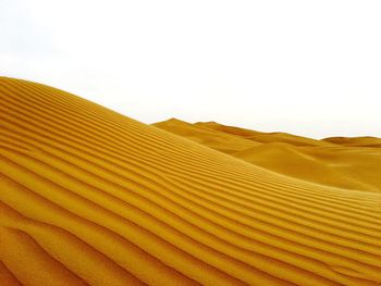 Scenic view of desert against clear sky