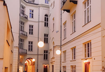 Low angle view of illuminated buildings at night