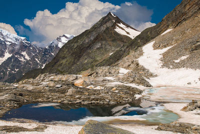 Alpine landscape with blue lake with clear water in the summer season, valle anzasca, piedmont