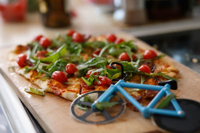 Close-up of pizza served on table