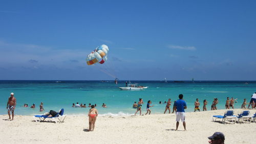 People enjoying at beach