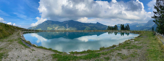 Panoramic view of lake and mountains against sky