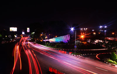 Light trails on road at night