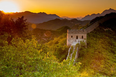 Great wall of china against clear sky during sunset