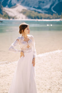 Woman standing on beach