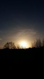 Silhouette landscape against sky during sunset