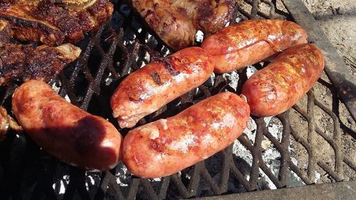 Close-up of meat on barbecue grill