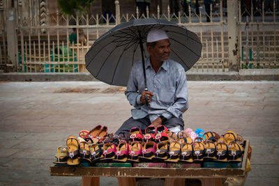 Man sitting in traditional clothing