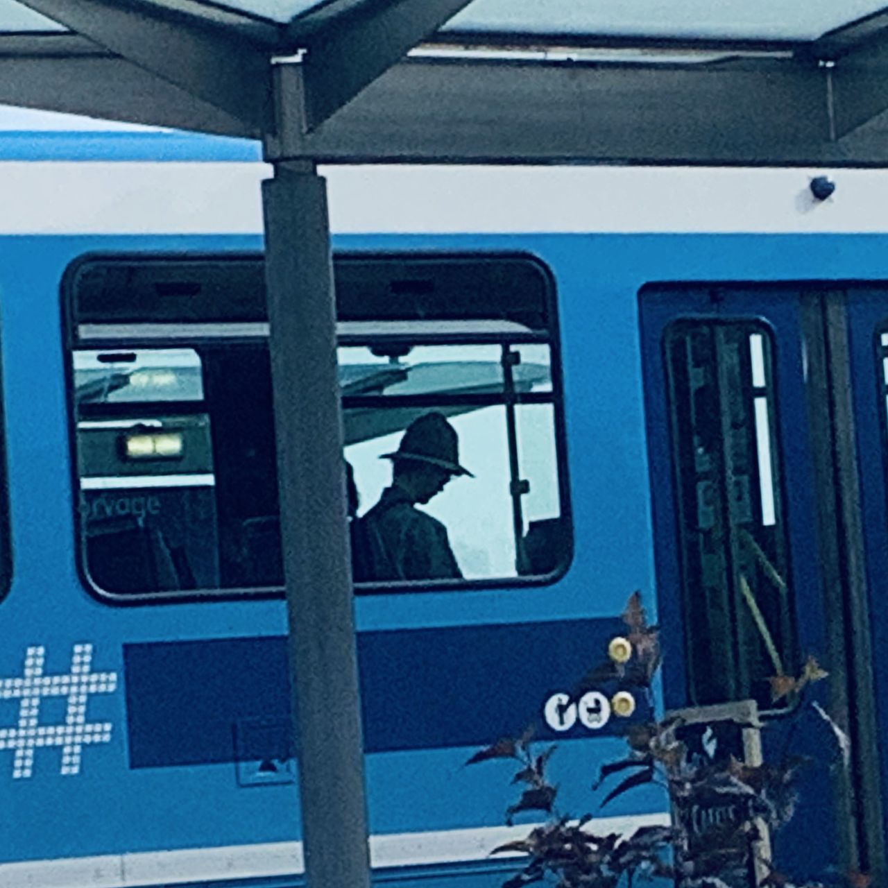 LOW ANGLE VIEW OF TRAIN AT WINDOW