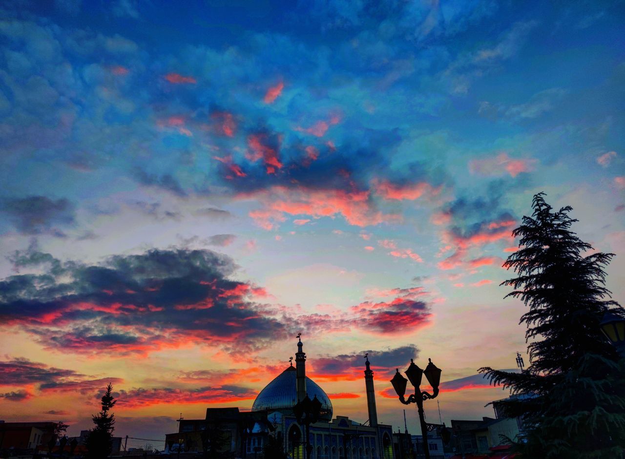 sky, cloud, architecture, sunset, evening, dusk, built structure, afterglow, building exterior, nature, horizon, building, travel destinations, tree, city, multi colored, beauty in nature, no people, religion, plant, scenics - nature, outdoors, silhouette, red sky at morning, sunlight, belief, travel, place of worship, dramatic sky