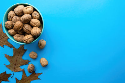 High angle view of bread on table against blue background