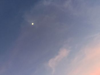 Low angle view of moon in sky