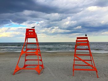 Scenic view of sea against cloudy sky