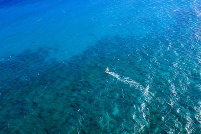 High angle view of blue sea