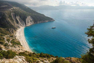 High angle view of sea and mountains