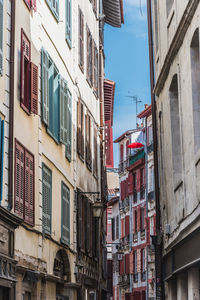 Low angle view of residential buildings against sky