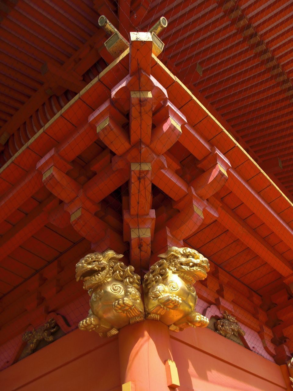 indoors, low angle view, religion, ceiling, illuminated, hanging, place of worship, spirituality, decoration, lighting equipment, art and craft, ornate, architecture, art, built structure, lantern, cultures, tradition, creativity