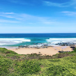 Scenic view of beach against sky