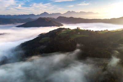 Scenic view of mountains against sky during sunset