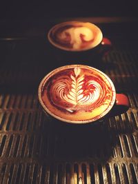 Close-up of cappuccino on table