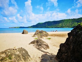 Scenic view of beach against sky