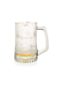 Close-up of beer glass against white background