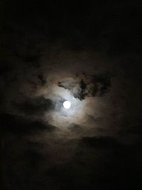 Low angle view of moon in sky at night