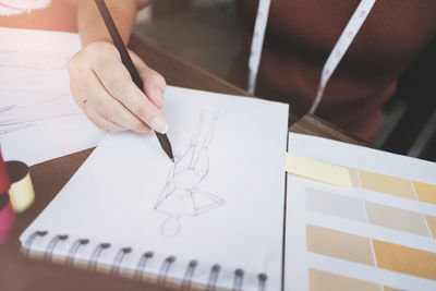 High angle view of woman working on table