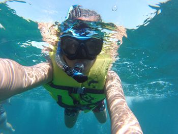 Man swimming in sea