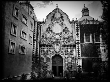Low angle view of old building against sky