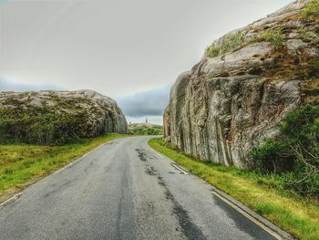 Country road passing through landscape